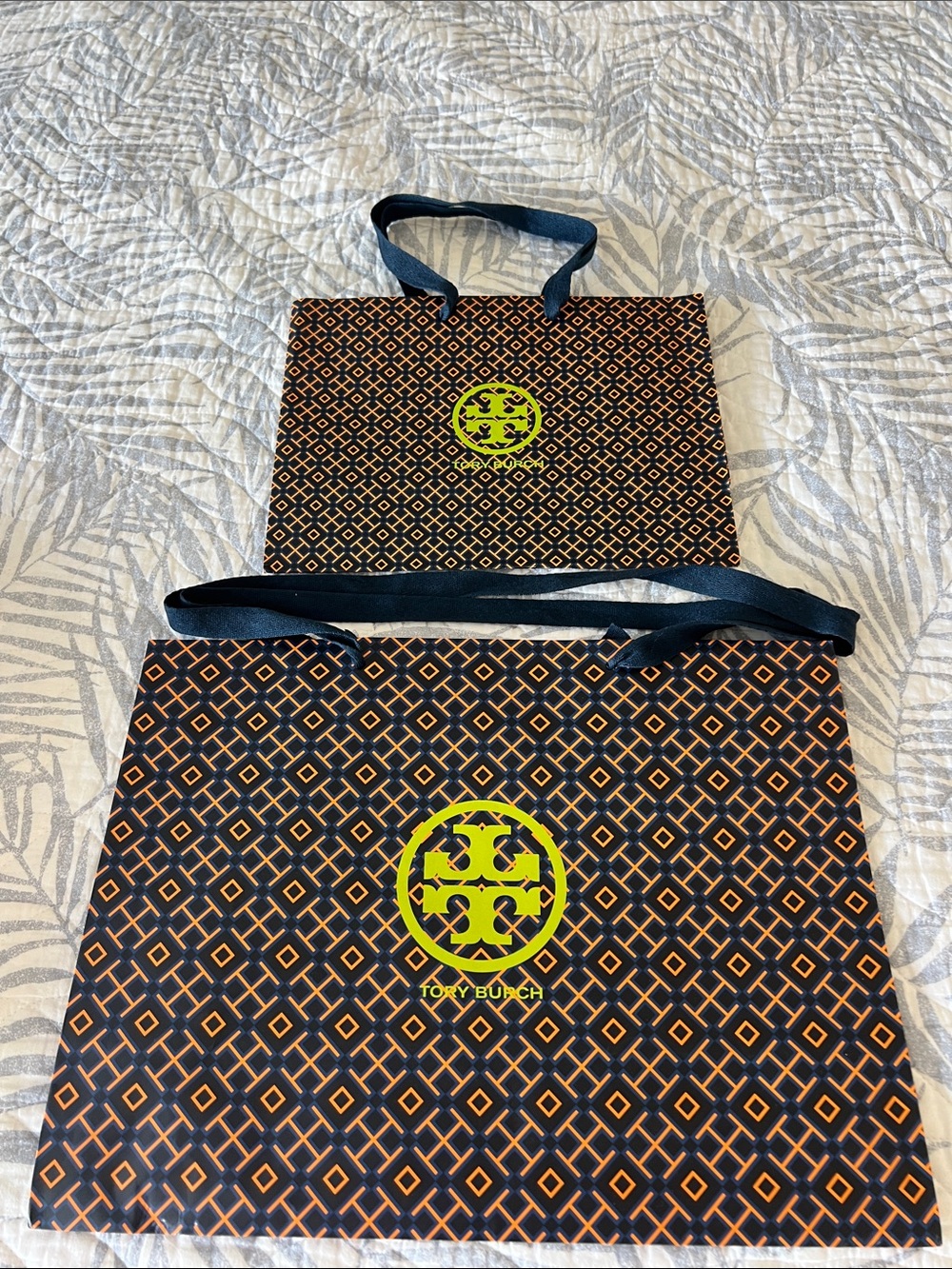Tory Burch Patterned paper Bags in Black and Orange